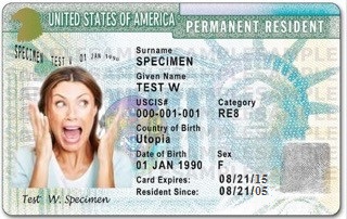 A photo of a man holding his expired green card